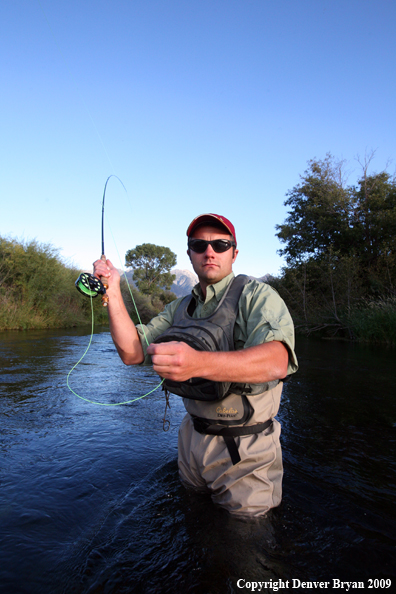 Flyfisherman casting