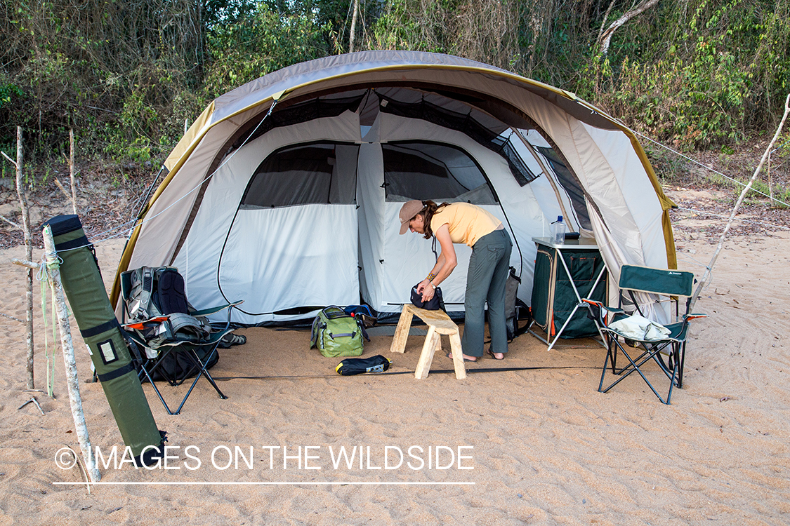 Flyfishing tent camp on the banks of river in Kendjam region, Brazil.