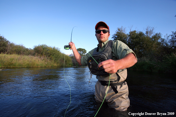 Flyfisherman casting