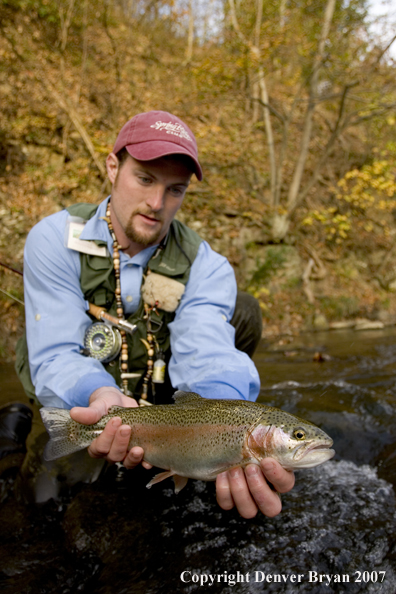 Flyfishermen with nice rainbow trout