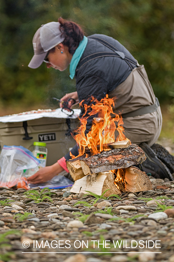 Camille Egdorf preparing shore lunch.