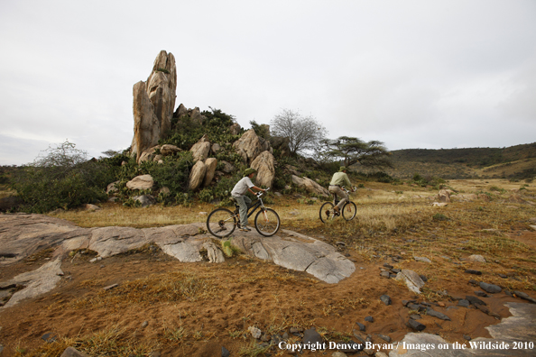 Family mountain biking on african safari