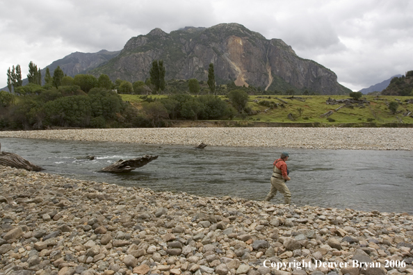 Flyfisherman casting from shore.