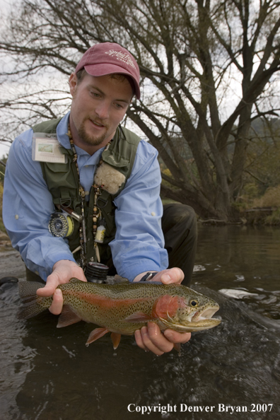 Flyfishermen with nice rainbow trout