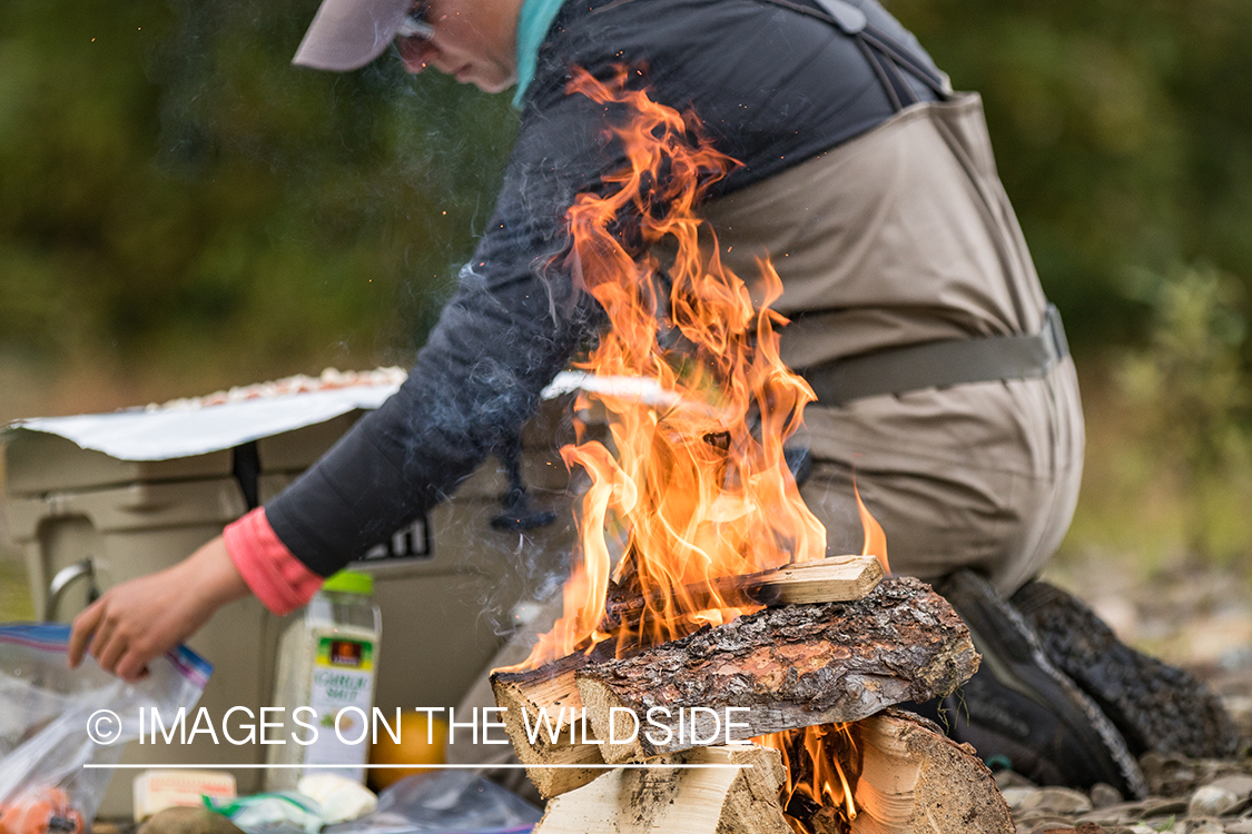 Camille Egdorf preparing shore lunch.