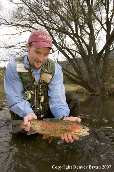 Flyfishermen with nice rainbow trout