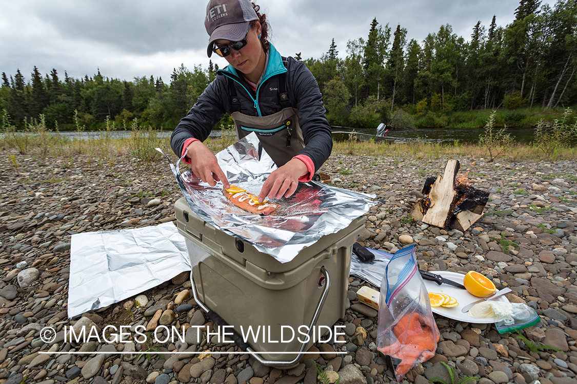 Camille Egdorf preparing shore lunch.