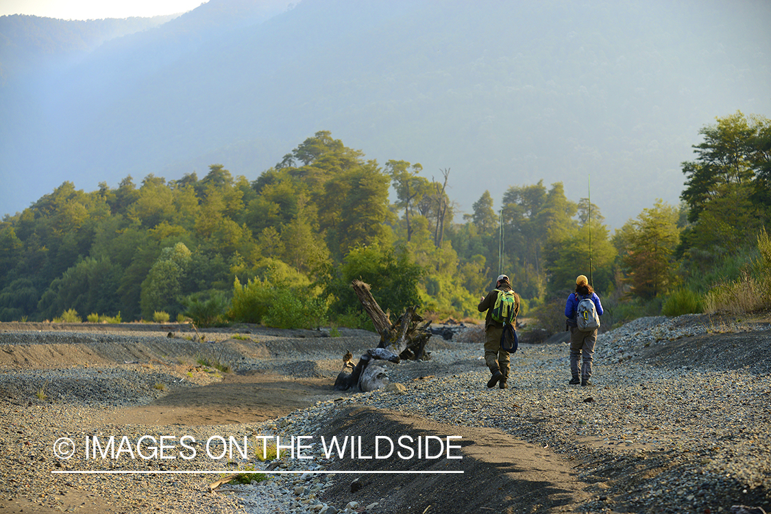 Fishermen walking in Chile.