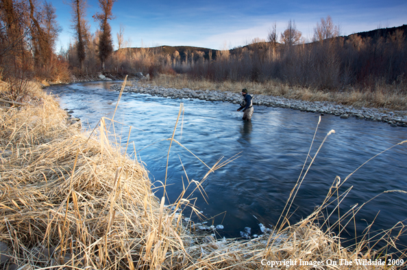 Flyfisherman on river.