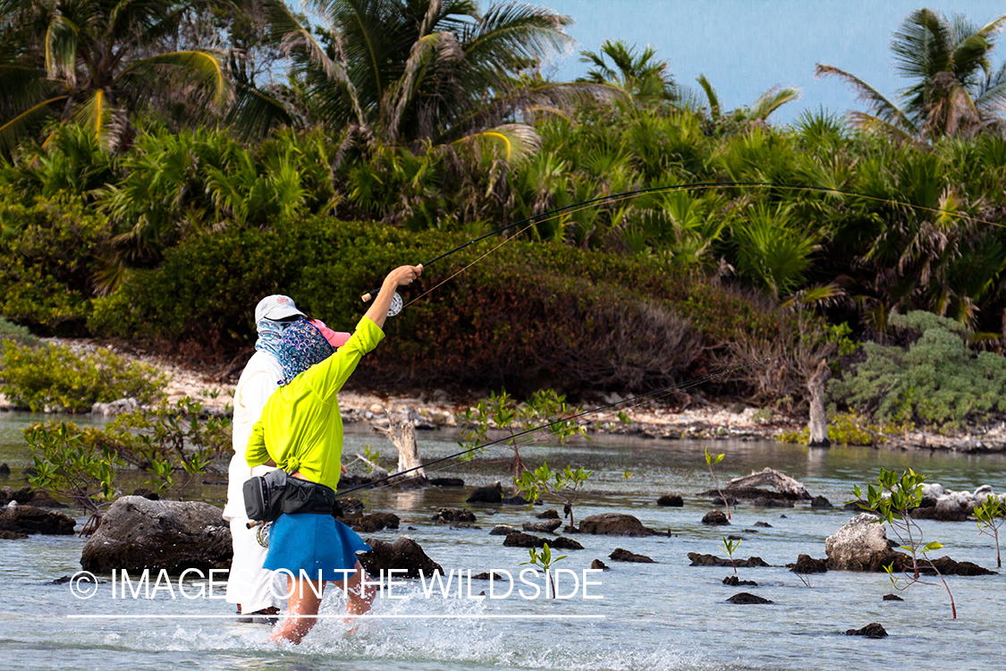 Flyfishing woman in flats.