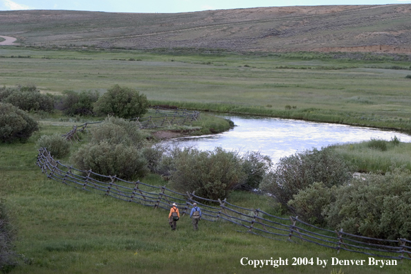 Flyfishermen walking to/from river.