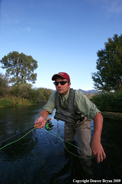 Flyfisherman casting