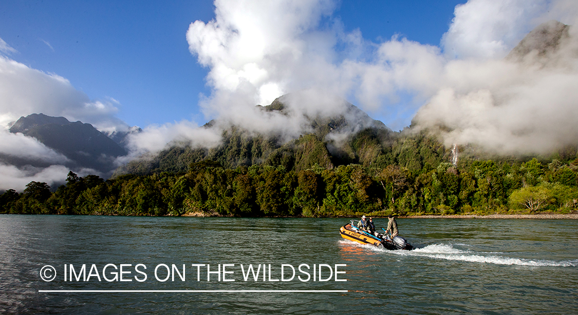 Flyfishermen on boat by Andes.