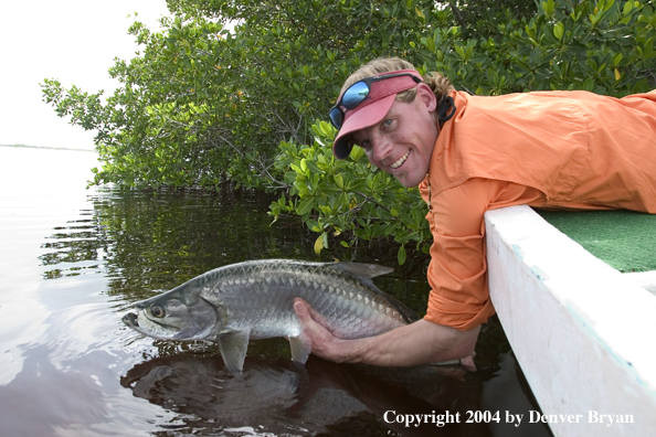 Flyfisherman releasing tarpon 