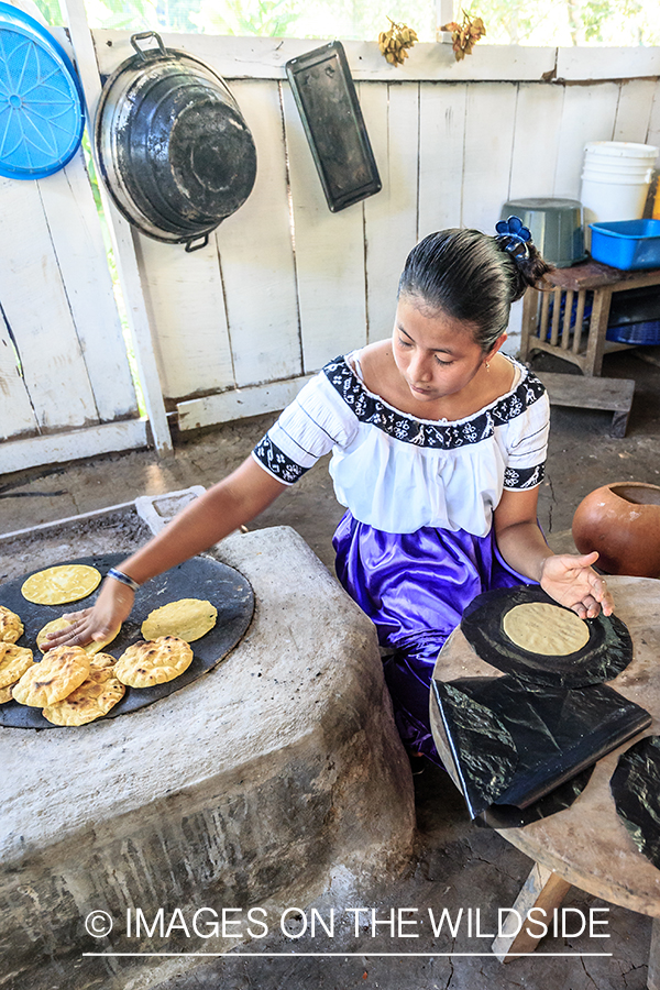 Local woman cooking in Belize.