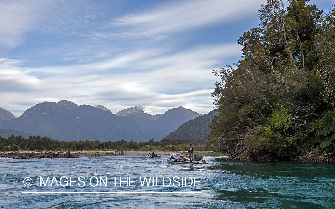 Flyfishermen on boat by Andes.