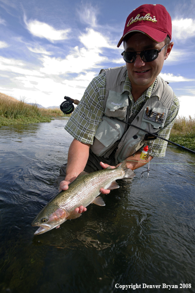 Flyfisherman with Rainbow Trout