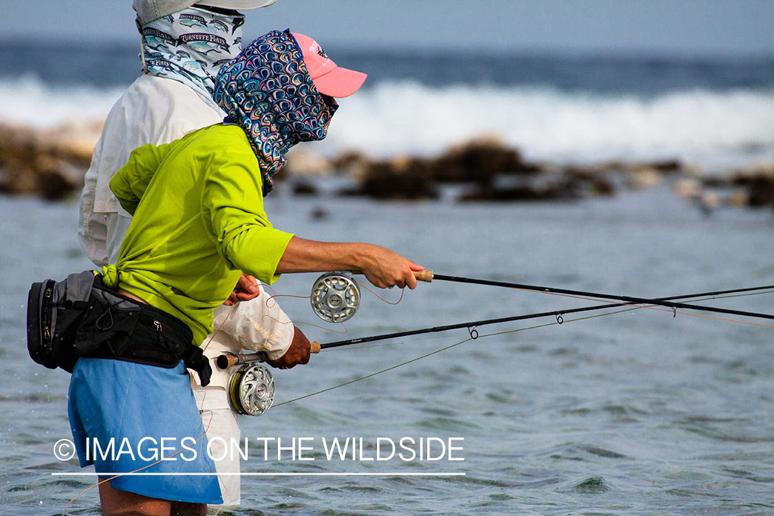 Flyfishing woman in flats.