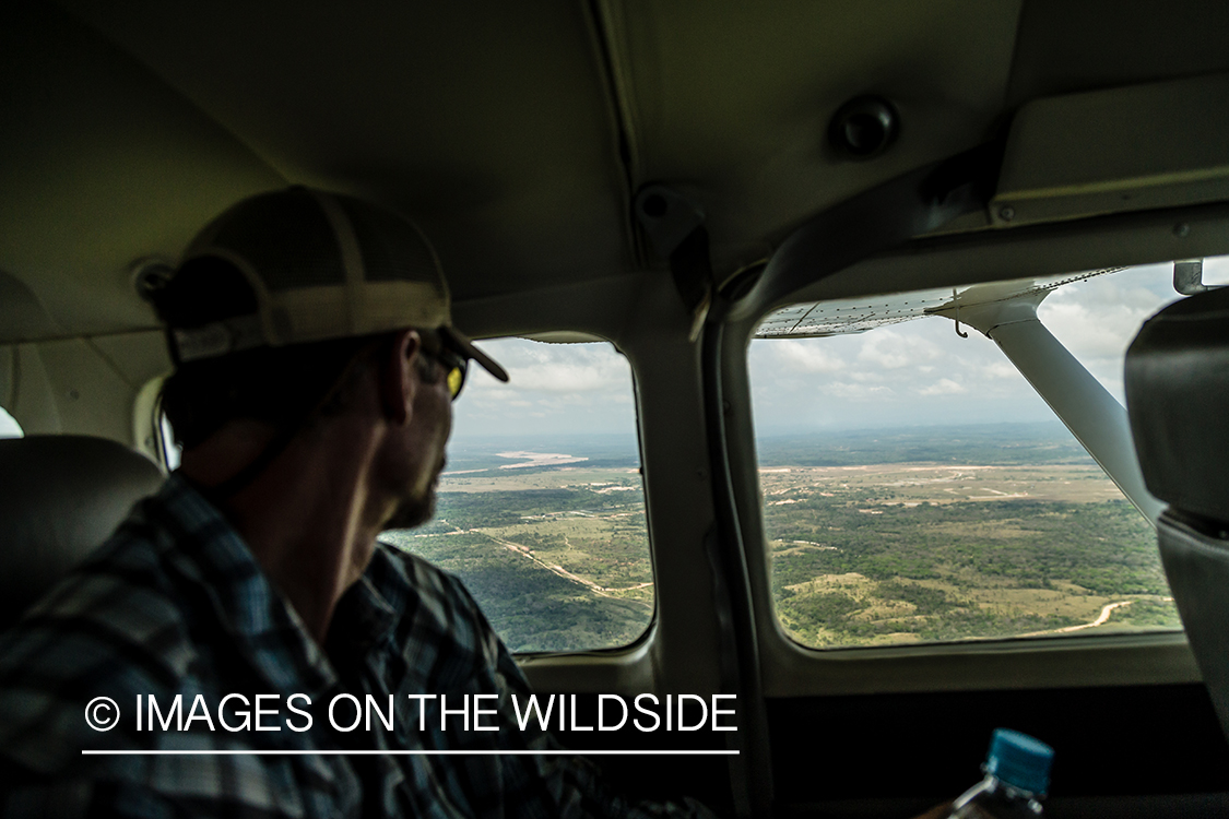 Flyfishing for Golden Dorado in Bolivia. (flyfisherman in plane)