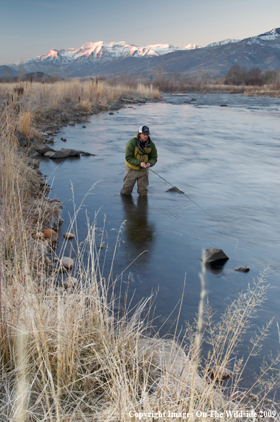 Flyfisherman on river.