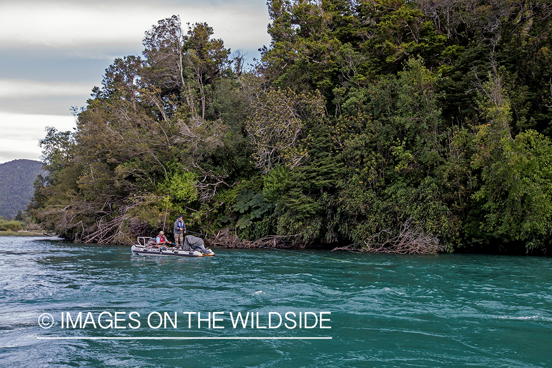 Flyfishermen on boat by Andes.