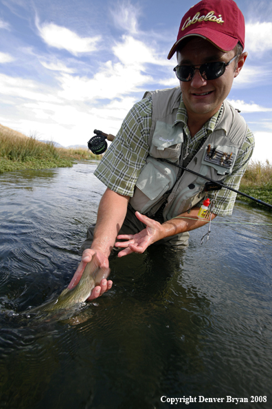 Flyfisherman with Rainbow Trout