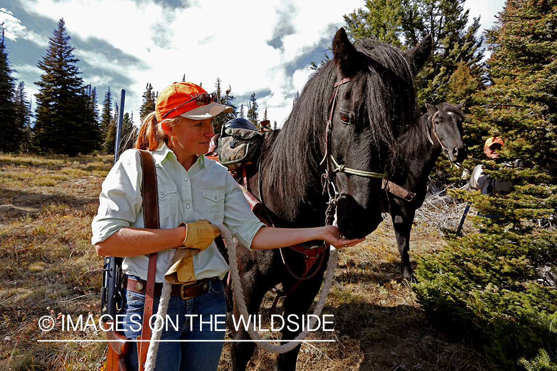 Upland game bird hunter with horse.