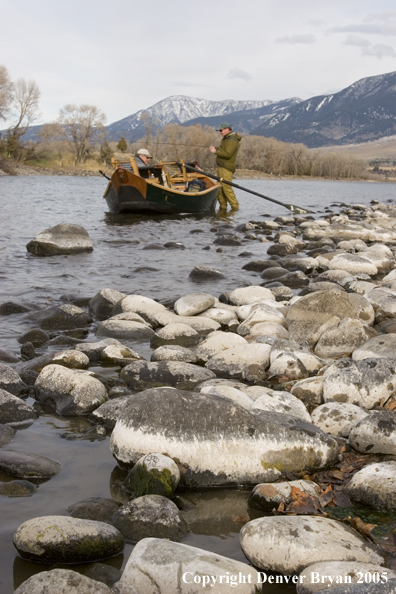 Drift boat on river.