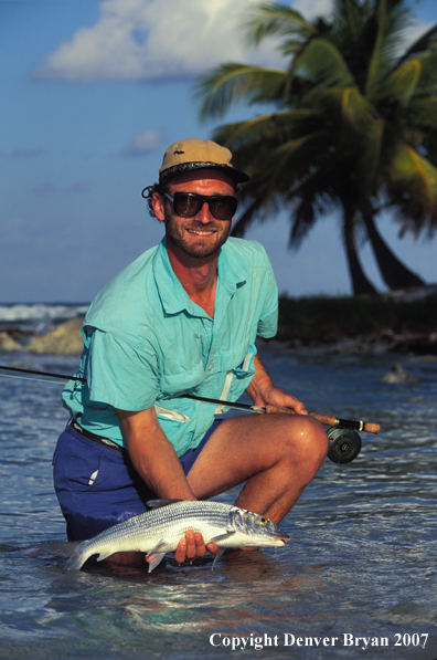 Saltwater flyfisherman holding bonefish.