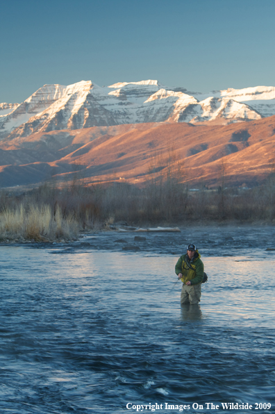 Flyfisherman on river.