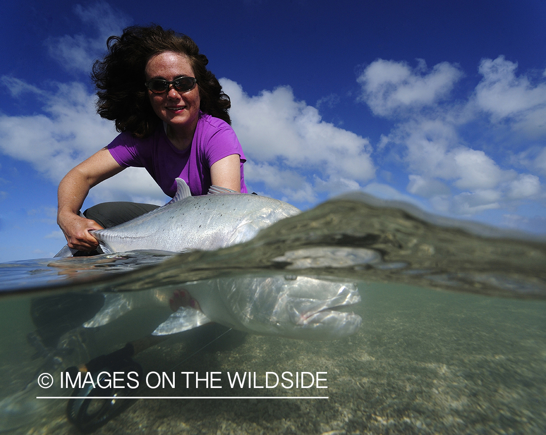 Flyfisherman with giant trevally.