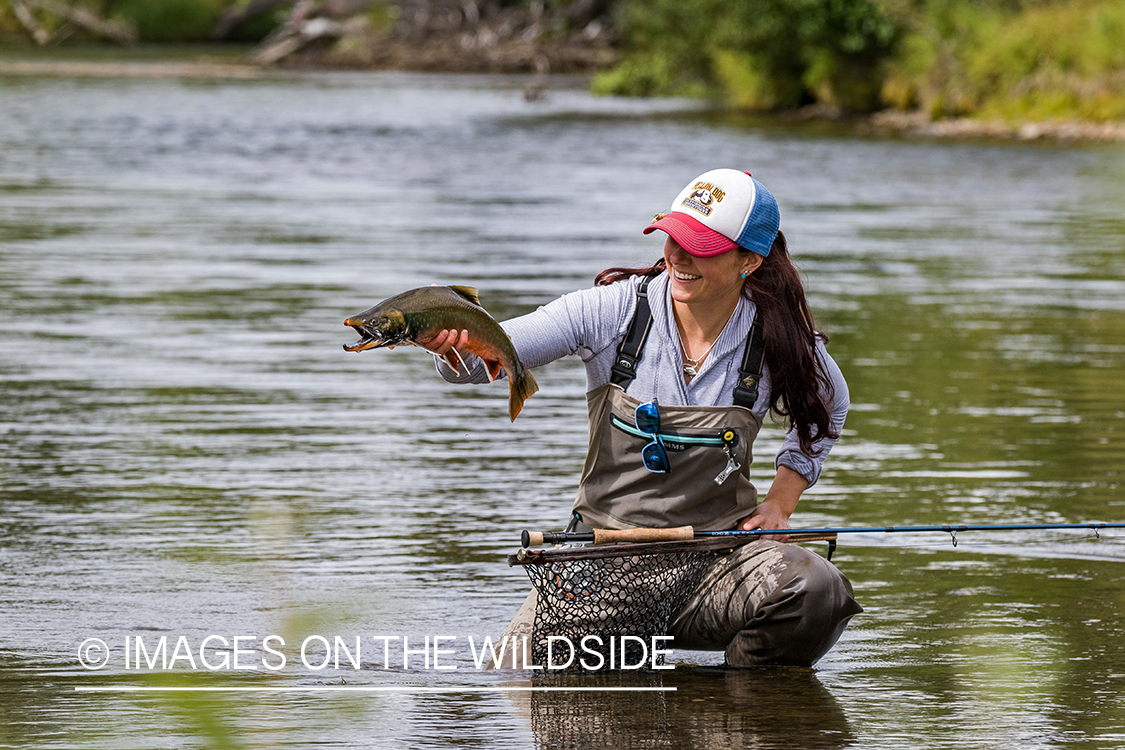 Flyfisher Camille Egdorf with Dolly Varden. Nushagak river, Alaska. 