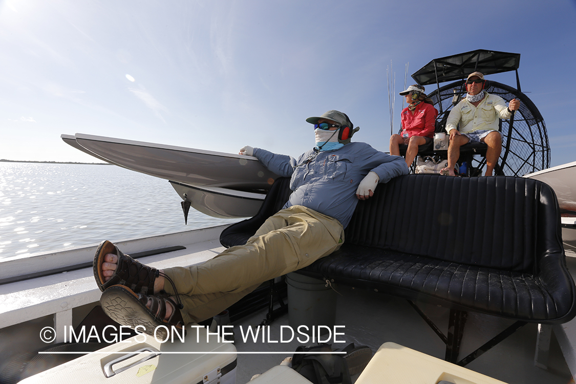 Saltwater flyfishermen on airboat.