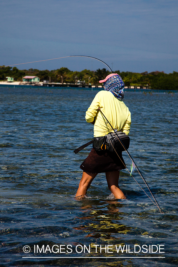 Flyfishing woman in flats.