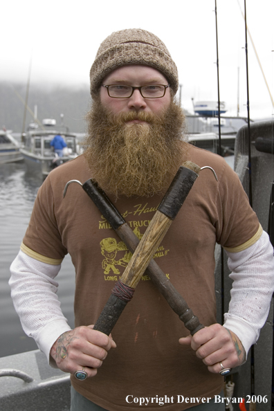 Boat captain with fish hooks.  