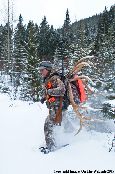 Hunter with elk rack