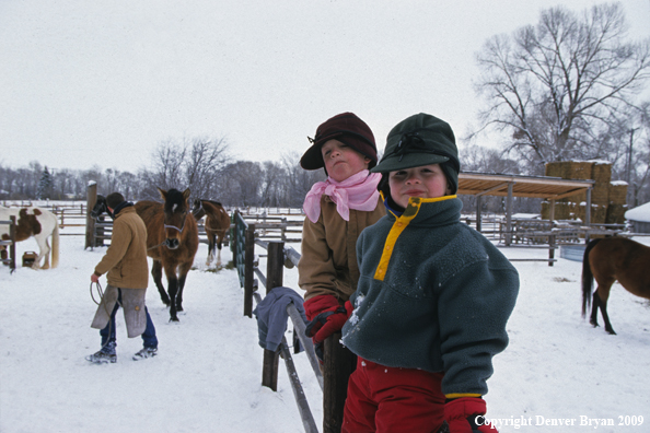 Young cowboys learning to ranch