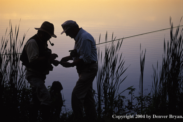 Flyfishermen choosing flies.