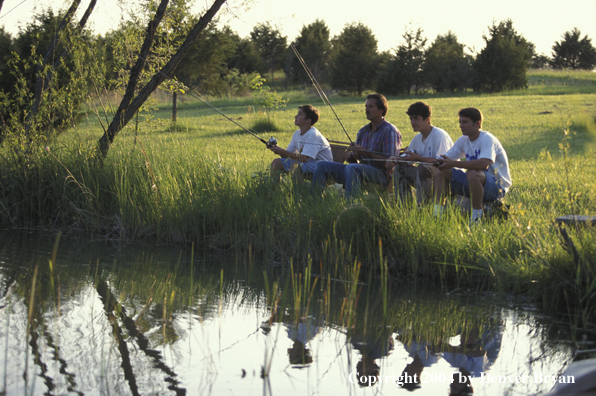 Father and sons spincast fishing