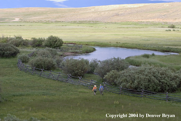 Flyfishermen walking to/from river.