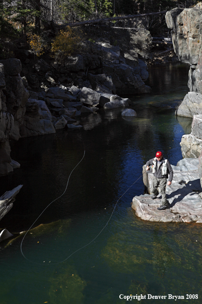 Flyfisherman Casting in Slot Canyon