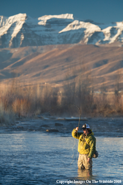 Flyfisherman on river.