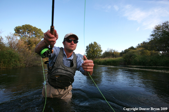 Flyfisherman casting