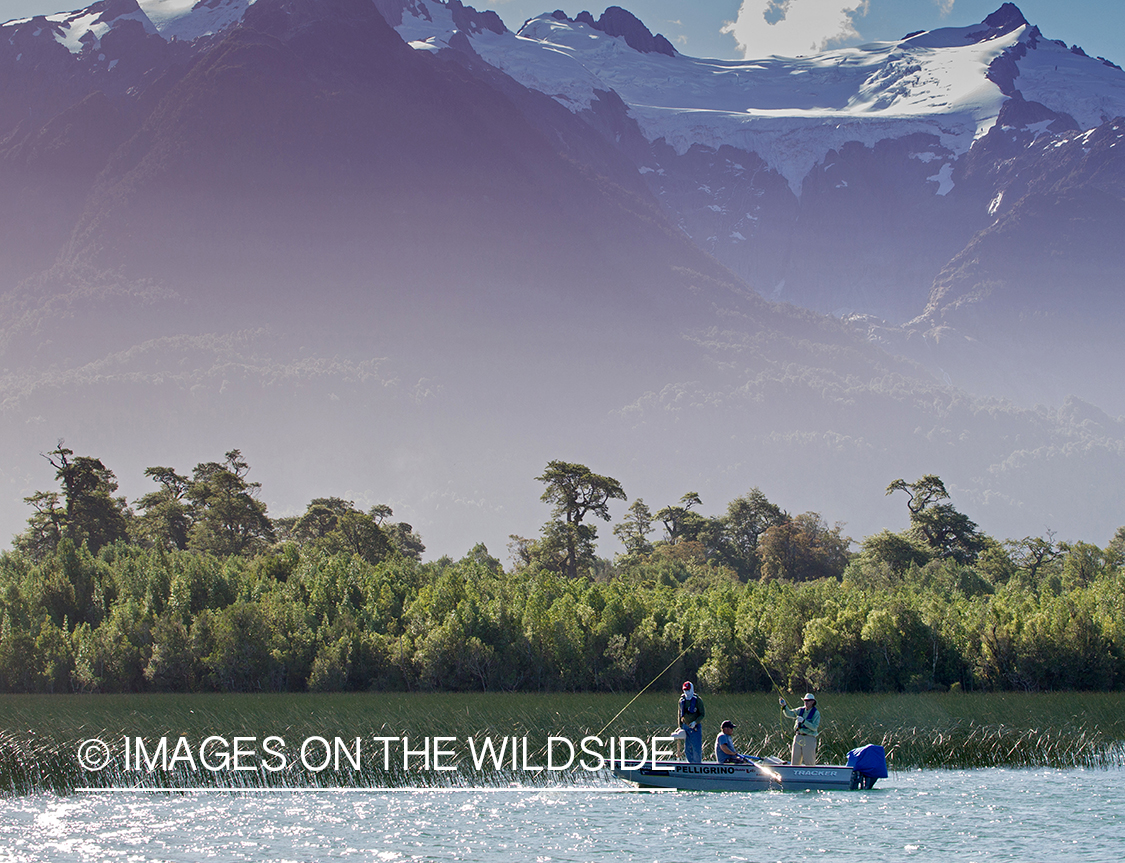 Flyfishermen on boat by Andes.