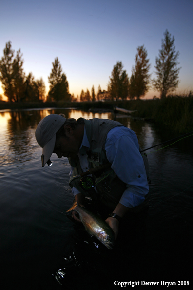 Flyfisherman with Rainbow Trout