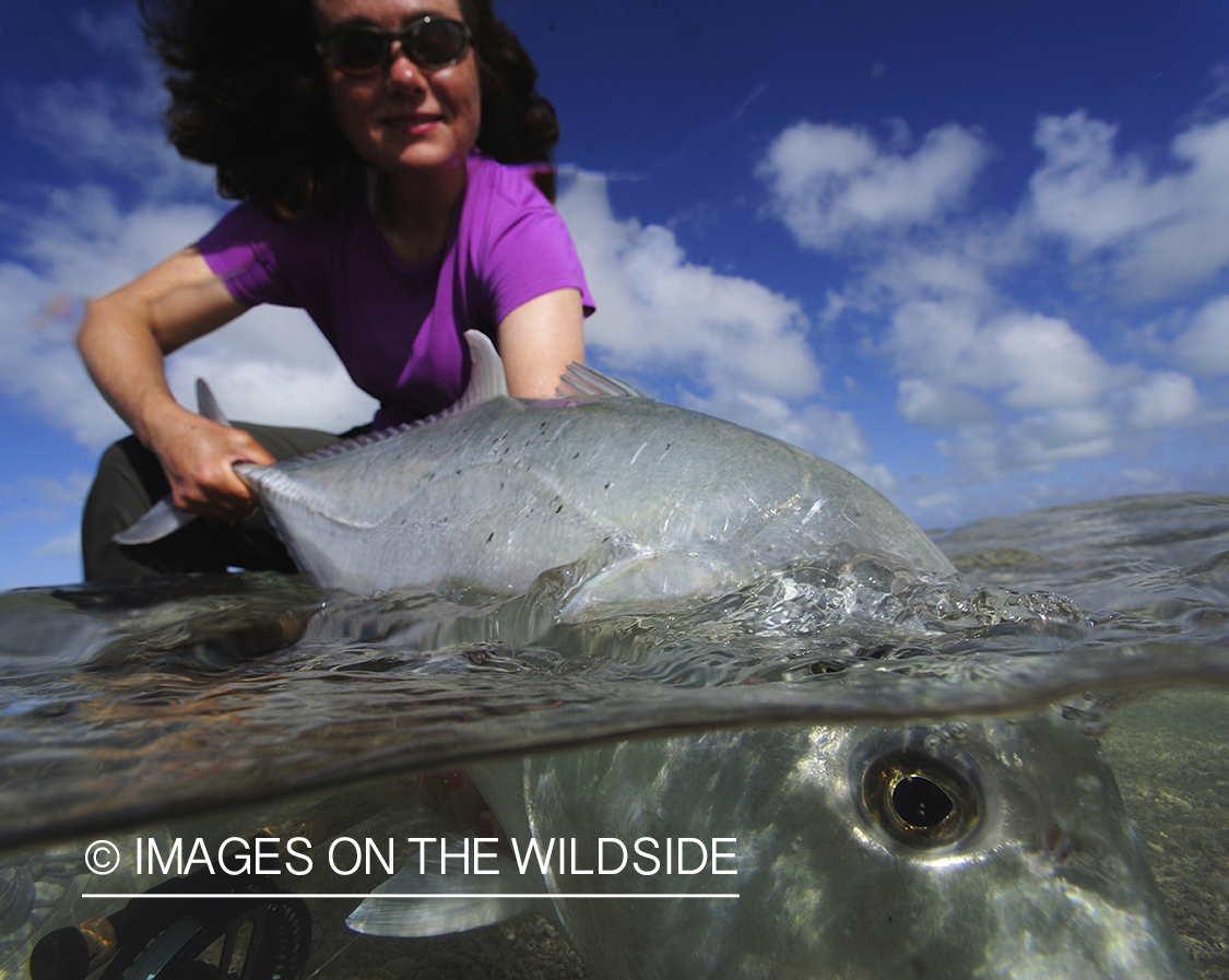 Flyfisherman with giant trevally.