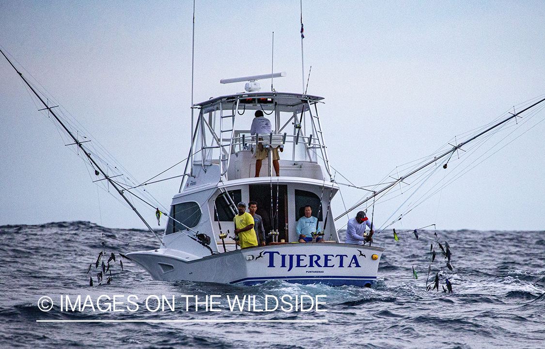 Fishermen on deep sea boat.