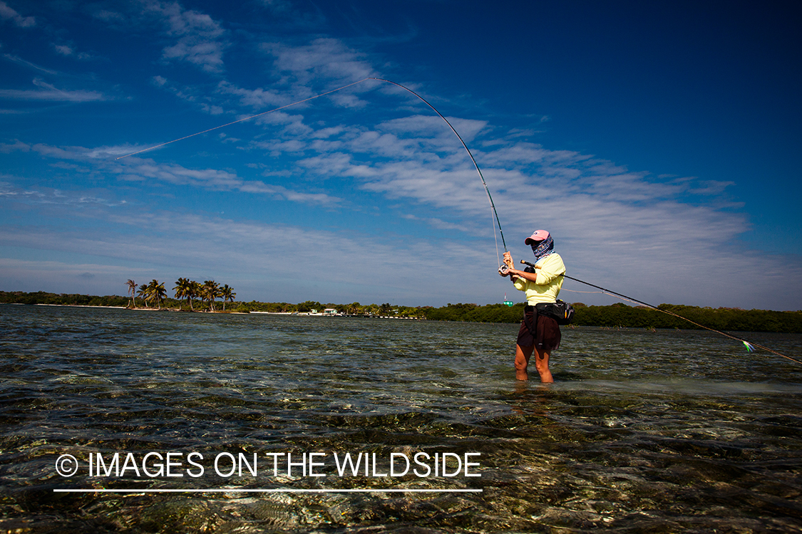 Flyfishing woman in flats.