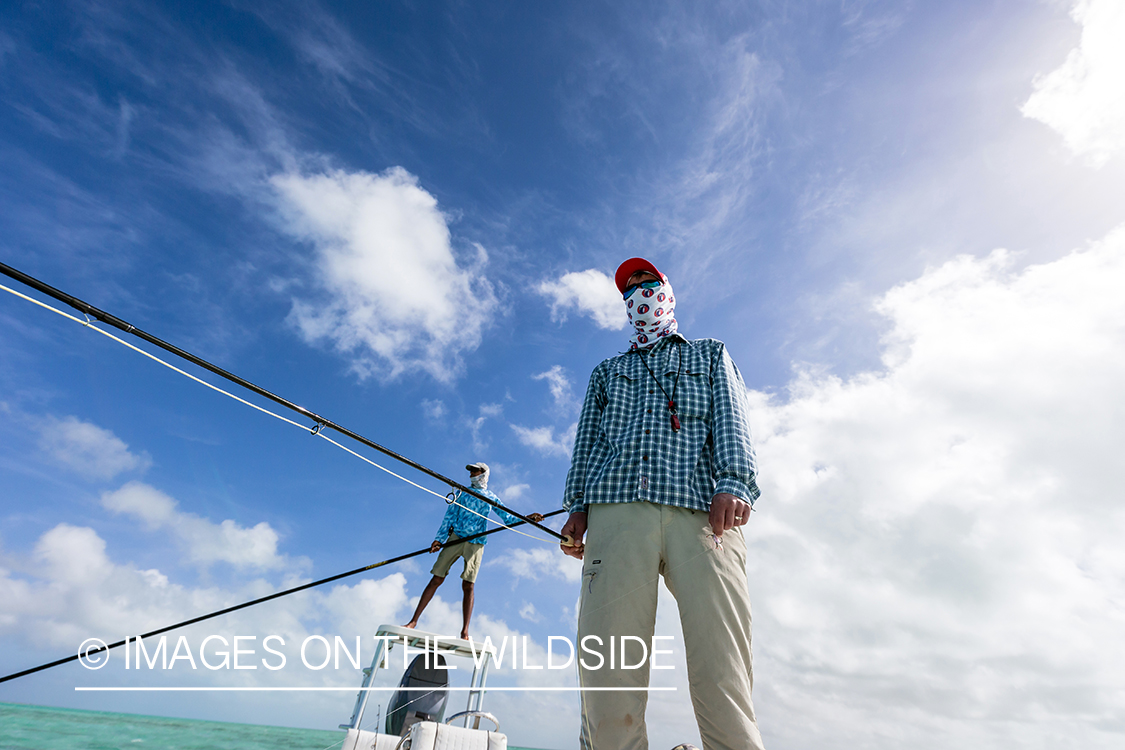 Flyfisherman on boat.