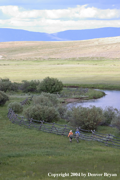 Flyfishermen walking to/from river.